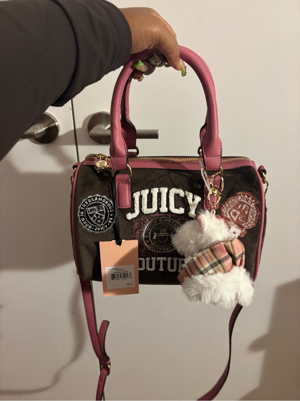 Juicy Couture varsity satchel color is chocolate Accent Logo Satchel